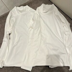 Set of white turtlenecks
